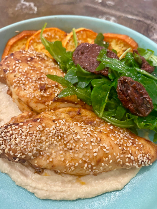 Fireworks Sheet Pan Chipotle Tomato Butter Chicken Shawarma with Sweet Potatoes and Hummus